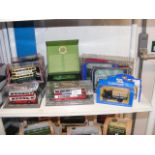 A medley of die cast model vehicles, including fro