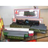 Two boxed Lima trains together with unboxed coache