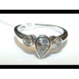 A 3 stone 'tear drop' diamond ring in 18ct white gold setting (approx. size M/N)