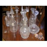 Eight cut glass decanters, varying in shape and si