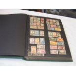 An album bearing stamps from French colonies 1890'