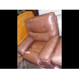A brown leather style electric reclining chair