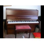 A Kemble modern upright overstrung piano, teak cas