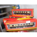 Four boxed Hornby coaches