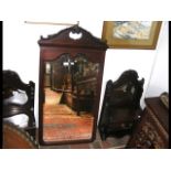 A Victorian mahogany mirror with two drawer units