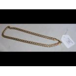 A 9ct gold gents curb necklace - 63 grams