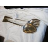 A Georgian silver serving fork, London 1787 togeth