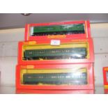 Four boxed Hornby coaches etc