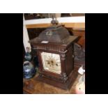 A Victorian oak cased two train mantel clock