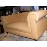 A Victorian style two seater Chesterfield settee
