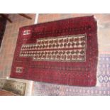 A Middle Eastern rug with red ground - 140cm x 88c