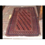 An antique Middle Eastern rug with red ground - 15