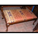 An antique long walnut footstool - 100cm x 52cm
