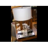 A table lamp on marble cube plinth, together with