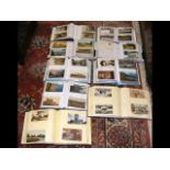 Nine albums containing collectable early postcards