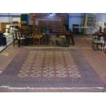 A Middle Eastern style carpet with geometric borde