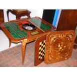 A reproduction games table with floral marquetry t