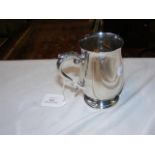 A silver tankard of baluster shape - approx. weigh