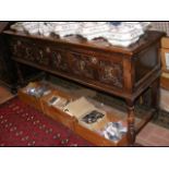 A period oak dresser base with three drawers to th
