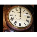 A 19th century mahogany circular wall clock with s