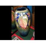 A very large Moorcroft Pottery vase with grape des