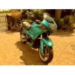 A turquoise BMW R1100 RS motorcycle, 1085cc, Reg N
