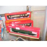 Four boxed Hornby coaches