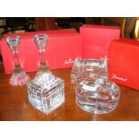 Four items of boxed Baccarat crystal including can