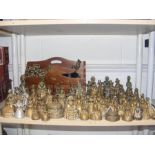 Various brass figural bells, stationery rack, etc.