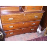 An antique three drawer chest