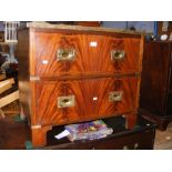 A two drawer campaign style reproduction chest wit