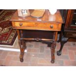 A 19th century side table on turned supports