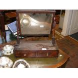 A 19th century mahogany toilet mirror with two dra