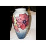 A 31cm high Moorcroft tube lined vase - with signa