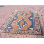 A Turkish style carpet with geometric border 8ft b