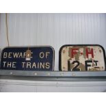 A cast iron vintage sign 'BEWARE OF THE TRAINS', t