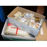 A box containing collectable cigarette cards - set