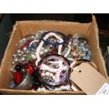 A box containing costume jewellery, including bang