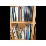 Two shelves of sailing related books including 'Ac