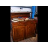 An inlaid mahogany chiffonier with brass gallery t