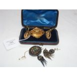An attractive antique brooch and earring set toget