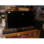 A Samsung UE32-J5100AK 32 inch TV together with Ph