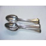 Eight silver Georgian serving spoons - 17 ounces