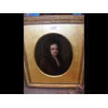 EARLY FRENCH SCHOOL - an oval oil painting of a 17