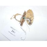 A 9ct 'mizpah' brooch together with one other and