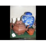 Oriental terracotta teapot, ginger jar and cover