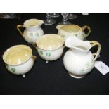 A small collection of Belleek ware, bearing three