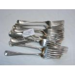 Fifteen silver dining forks - 35 ounces