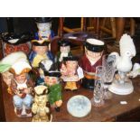 A cluster of character jugs and Foley china Isle o