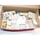 A quantity of collectable sets of cigarette cards,